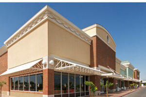 The exterior of a large commercial department store building, representing the commercial pest control and retail facility management services provided by Omaha Pest Control in Nebraska.