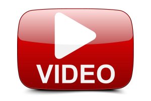 Large red video play button icon with the word "VIDEO" in white text, used to link to Omaha Pest Control's educational videos.